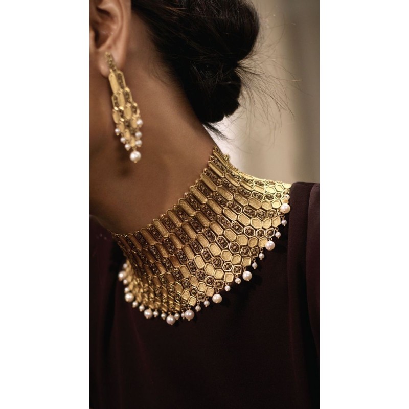 Choker and earrings.