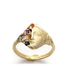 Gold and precious stone ring.