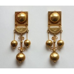 Gold earrings.