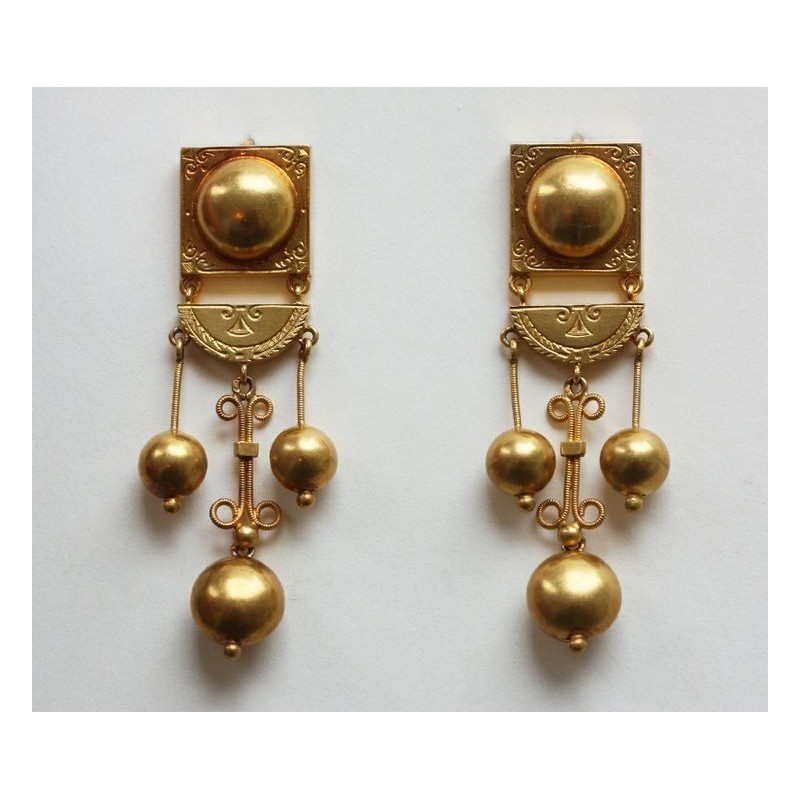 Gold earrings.